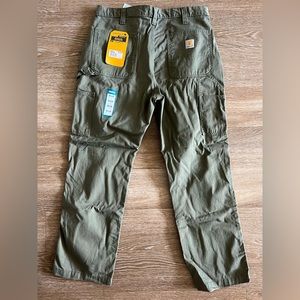 Carhartt Men’s Relaxed fit twill utility work pant. Color - army green